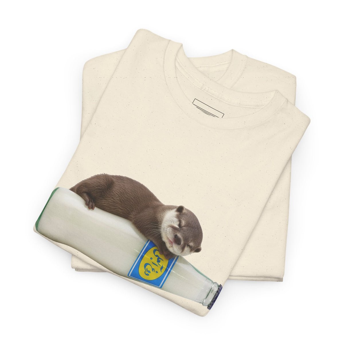 Natural – Otter on AbAli Tee – folded